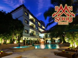 Baan Souy Resort, a gay-friendly hotel. Night view of the pool and building. A great destination for gay men's travel and relaxation.