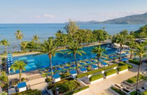 Hyatt Regency Phuket Resort aerial view. Gay-friendly hotel with pool, beach, palm trees, and ocean views. An ideal gay travel destination.