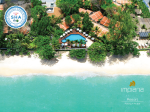 Aerial view of Impiana Resort Patong, a gay-friendly hotel. Pool, beach, and lush greenery. Ideal for gay travel in Phuket, Thailand.