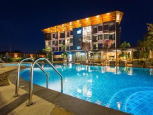 The Tama Hotel's pool at night. This gay-friendly hotel offers a relaxing and welcoming atmosphere for gay travelers. Enjoy your stay!