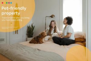 K+K Hotel Fenix gay-friendly, pet-friendly: Two women and two dogs relax on a bed. A welcoming, inclusive hotel for travelers with pets.