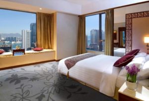 Lan Kwai Fong Hotel @ Kau U Fong room. Gay-friendly hotel with city view. Modern design, comfortable bed, and scenic Hong Kong skyline.