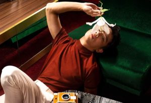 Stories Hotel Budapest: Man with flower. Gay-friendly hotel. Stylish, modern design for gay travelers. Budapest travel advice.