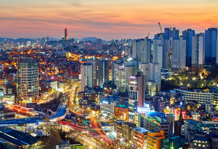 Seoul cityscape at dusk. Popular gay hotel in Seoul, perfect for gay travelers. Night view of the city, ideal for gay tourism.