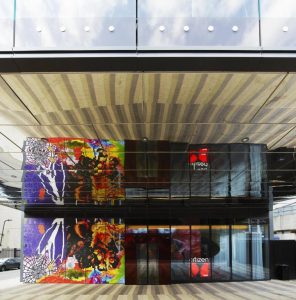 citizenM London Shoreditch's exterior. This gay-friendly hotel features colorful murals and modern architecture in Shoreditch, London.