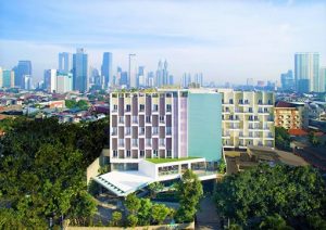 Ayaka Suites, a gay-friendly hotel. Modern building with city skyline backdrop. Ideal for gay travelers seeking comfort and style.