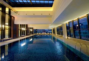 Indoor pool at the gay-friendly Conrad Seoul hotel. A luxury travel destination for gay men. Relax and enjoy your stay in Seoul.