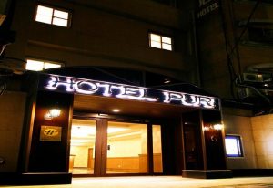 Hotel Puri Ximen entrance at night. Gay-friendly hotel in Taipei, Taiwan. A great choice for gay travelers.