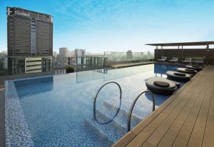 Liberty Central Saigon Citypoint Hotel rooftop pool. Gay-friendly hotel with city views. Ideal for gay travel in Saigon.