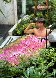 Gay man in Shinta Mani Angkor pool villa, Siem Reap. Most popular Bensley Collection pool villas for gay travel. Luxury gay travel.