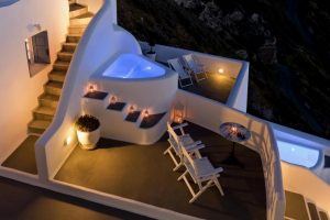 Kamares Apartments: Gay-friendly hotel with a jacuzzi. White architecture, stairs, and lounge chairs create a relaxing vacation vibe.