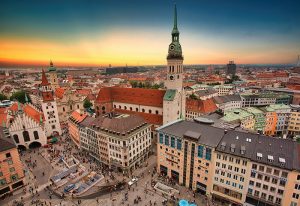Marienplatz, Munich Gayborhood travel guide. Aerial view of the city center, buildings, and people. A must-see spot for gay travelers.