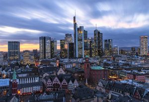 Frankfurt skyline at dusk. Gay Frankfurt travel guide. Skyscrapers and old town architecture. This Year Update Number One Gay Travel Guide.
