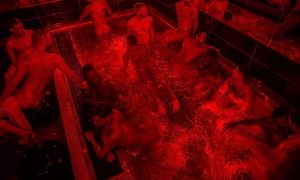 Red-lit jacuzzi filled with men at one of London's gay saunas. Best gay saunas in London this year update.