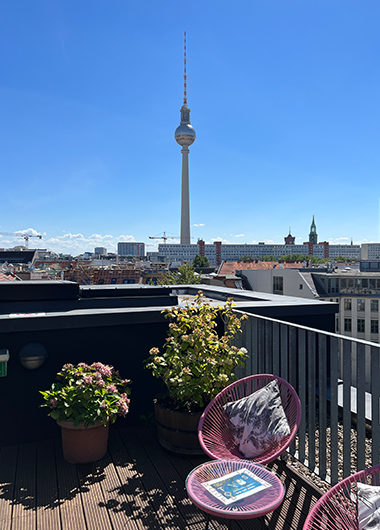 The Weinmeister Berlin-Mitte hotel rooftop view. Berlin TV Tower in the background. Gay travel destination, top hotel list.