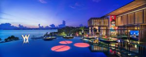 WOOBAR Pride Party in Samui. Luxury gay travel destination with infinity pool, ocean view, and vibrant nightlife. Pride celebration.