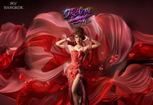 Drag queen in red dress for Drag Me to SO/ Party, Bangkok's best Gay Pride party this year. Gay travel advice, SO/ Bangkok hotel.