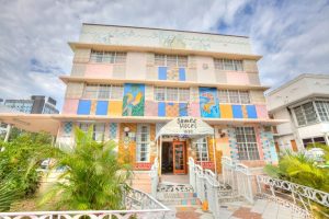 James Hotel, a gay-friendly hotel. Colorful facade with tropical art. A welcoming spot for LGBTQ+ travelers. Miami Beach hotel.