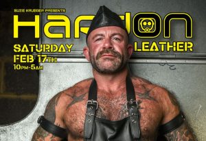 HARD ON LEATHER event, Feb 17th. Muscular, tattooed man in leather cap & apron. Gay travel, fetish scene, leather bar, gay event.