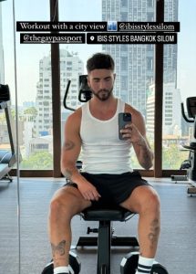 Gay man at Ibis Styles Bangkok Silom gym. Gym with city view. Best budget gay hotels in Bangkok with rooftop pool and gym. The Gay Passport.