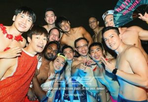 HYPERSPLASH Cruel Summer: Group of shirtless gay men smiling at a party. Gay travel at 1-Altitude Coast. Singapore gay event.