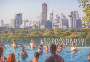 SO/ Bangkok Pool Party with gay men enjoying the infinity pool. Skyline view. #SOPOOLPARTY. Gay travel in Thailand.