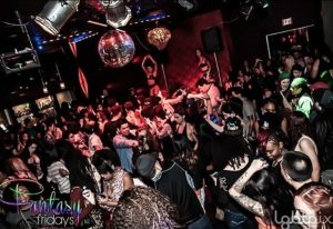 Robertson Nightclub party scene. A crowd of gay men and women dance under disco balls. Nightlife at its finest. #gaytravel #nightclub