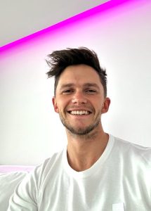 St Martins Lane Hotel London: Smiling man. Gay hotels in London near the city center. Gayborhood travel advice for gay men.