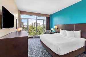 Best Western Plus Hotel Montreal guest room with a large window view. Gay-friendly hotel near Montreal's gay village.