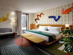 The Drake Hotel's gay-friendly room boasts modern art, a king bed, and city views. This hotel is a top choice for gay men travel.