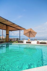 Hotel Amaca Puerto Vallarta Adults Only pool view. Gay-friendly hotel with ocean view. Tropical vacation destination for gay travelers.