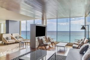 Lounge at Live Aqua Beach Resort Cancun, an adults-only, all-inclusive, gay-friendly hotel. Ocean view seating area.