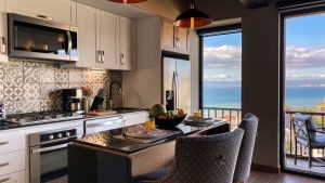 Pinnacle Resorts 179 adults-only gay-friendly hotel kitchen. Ocean view from balcony. Modern appliances, stylish design. Travel advice.
