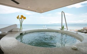 Pinnacle Resorts 180 gay-friendly hotel. Hot tub with ocean view. Luxury travel for gay men. Puerto Vallarta vacation. Relaxing getaway.