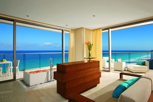 Secrets The Vine Cancun Resort & Spa luxurious suite. Ocean view from balcony with tub. All-inclusive, adults-only, gay-friendly hotel.