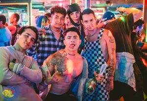 Gay Mexico City: A group of gay men pose at a Mexico City nightclub. Nightlife is an essential part of gay travel in Mexico City.