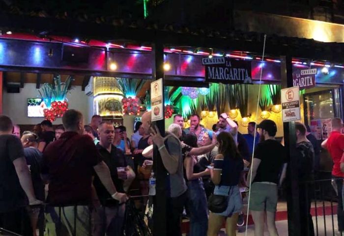 Night view of La Cantina Margarita Gay Bar in Puerto Vallarta. Crowded bar scene. Gay travel destination. Nightlife.