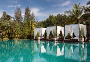 The Sarojin Khao Lak: Tranquil pool view with cabanas. A gay-friendly resort, perfect for relaxing travel. Tropical paradise. 18351350.jpg