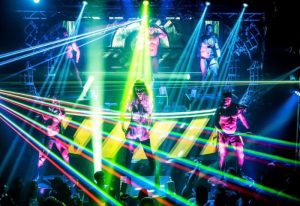 Milan Gate Party: DJ & dancers under laser lights. Gay nightlife travel advice. Milan, Italy.