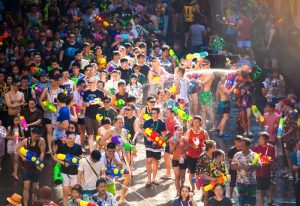 People Enjoying Waterfighting during Songkran Festival in Bangkok