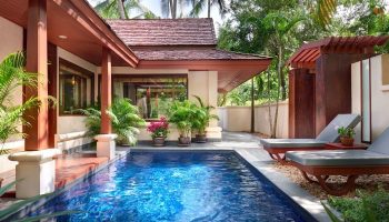Santiburi Koh Samui Deluxe Pool Villa pool area. Private pool with sun loungers. Tropical gay travel. Gay-friendly hotel in Thailand.