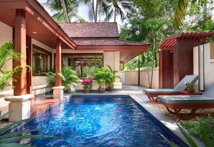 Santiburi Koh Samui Deluxe Pool Villa pool area. Private pool with sun loungers. Tropical gay travel. Gay-friendly hotel in Thailand.