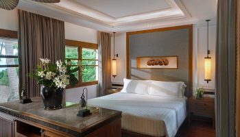 Santiburi Koh Samui's Grand Deluxe Beachfront Villa bedroom. Two-bedroom villa with private pool. Luxury gay travel in Thailand. Maenam beachfront.