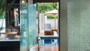 Santiburi Koh Samui Deluxe Pool Villa bathroom. Private pool view from luxurious bathroom. Gay travel to Thailand.