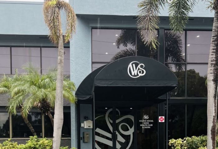 Wilton Social Club entrance. Gay men's health club and sauna. Palm trees, modern building. 1-12.jpg. Gay travel advice.
