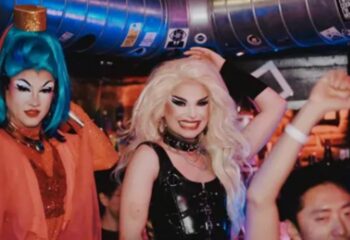 Drag queens at 101 Club, Rome. Gay nightlife travel advice. Performers in wigs and costumes. Gay bar scene in Italy.