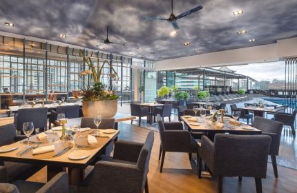 il Cielo interior at voco Orchard Singapore, an IHG Hotel. Fine dining restaurant with pool view. Gay travel advice.
