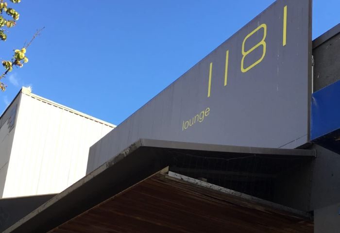 1181 Lounge sign in Vancouver. Gay travel advice for Vancouver's nightlife. Popular gay bar with a lounge. Vancouver's best gay bar.
