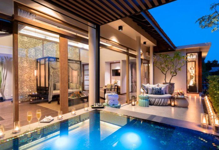 The Sarojin Khao Lak villa pool view. Luxury gay travel in Thailand. Private pool, outdoor lounge, and elegant interiors. Romantic getaway.