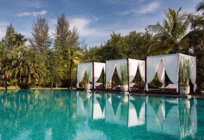 The Sarojin Khao Lak: Tranquil pool view with cabanas. A gay-friendly resort, perfect for relaxing travel. Tropical paradise. 18351350.jpg